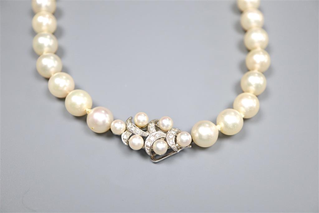 A modern single strand cultured pearl necklace with diamond set 585 white metal, cultured pearl and diamond set clasp,